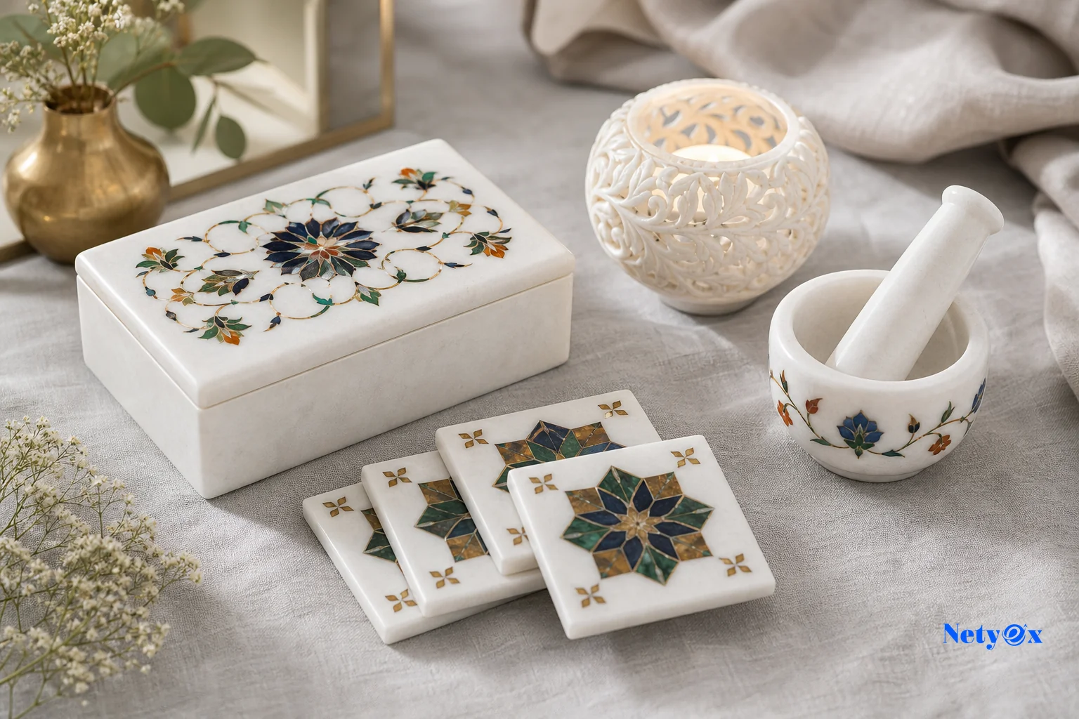 Diverse range of Indian marble handicraft products including inlay jewelry boxes, coasters, candle holders, and mortar and pestle sets