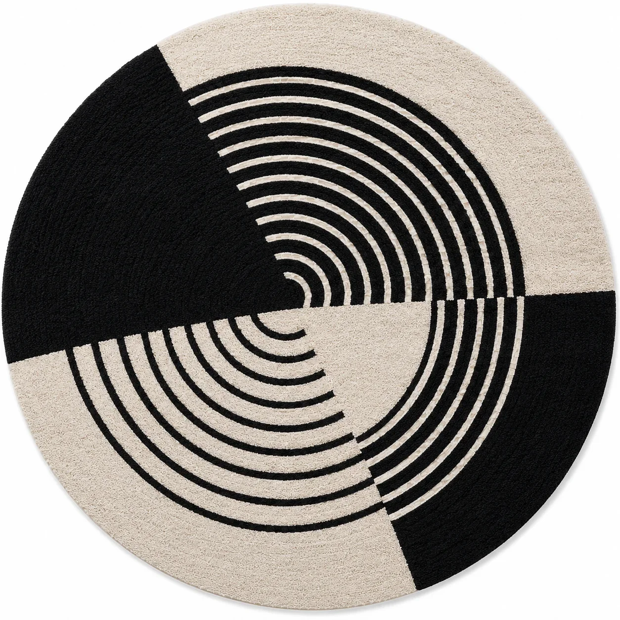 Product photo of "Noir Orbit Round Hand Tufted Wool Rug". The Noir Orbit Rug brings bold monochrome elegance to contemporary interiors. Designed in a distinctive round silhouette, this hand tufted woo